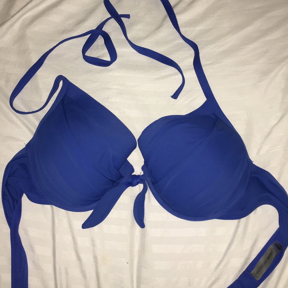 Blue halter bathing suit top with tie detail
